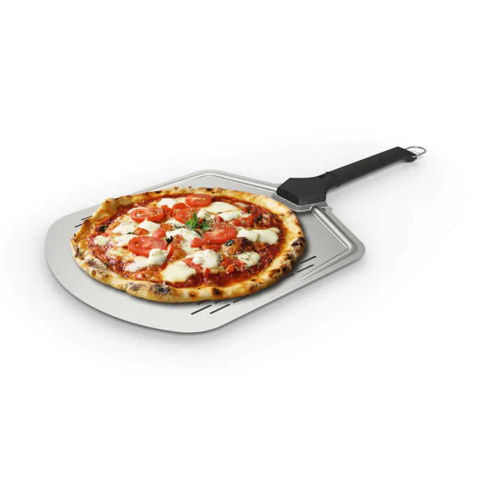 Witt Perforated Pizza Peel 14-inch holding fresh cooked pizza