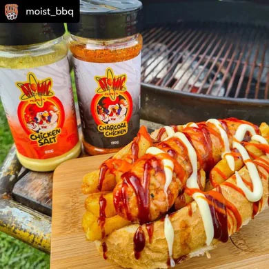 Loaded fries topped with buffalo sauce and Atomic Chicken seasonings