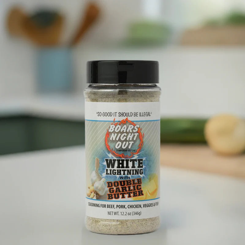Boars Night Out Double Garlic Rub displayed in a kitchen setting with vegetables in the background