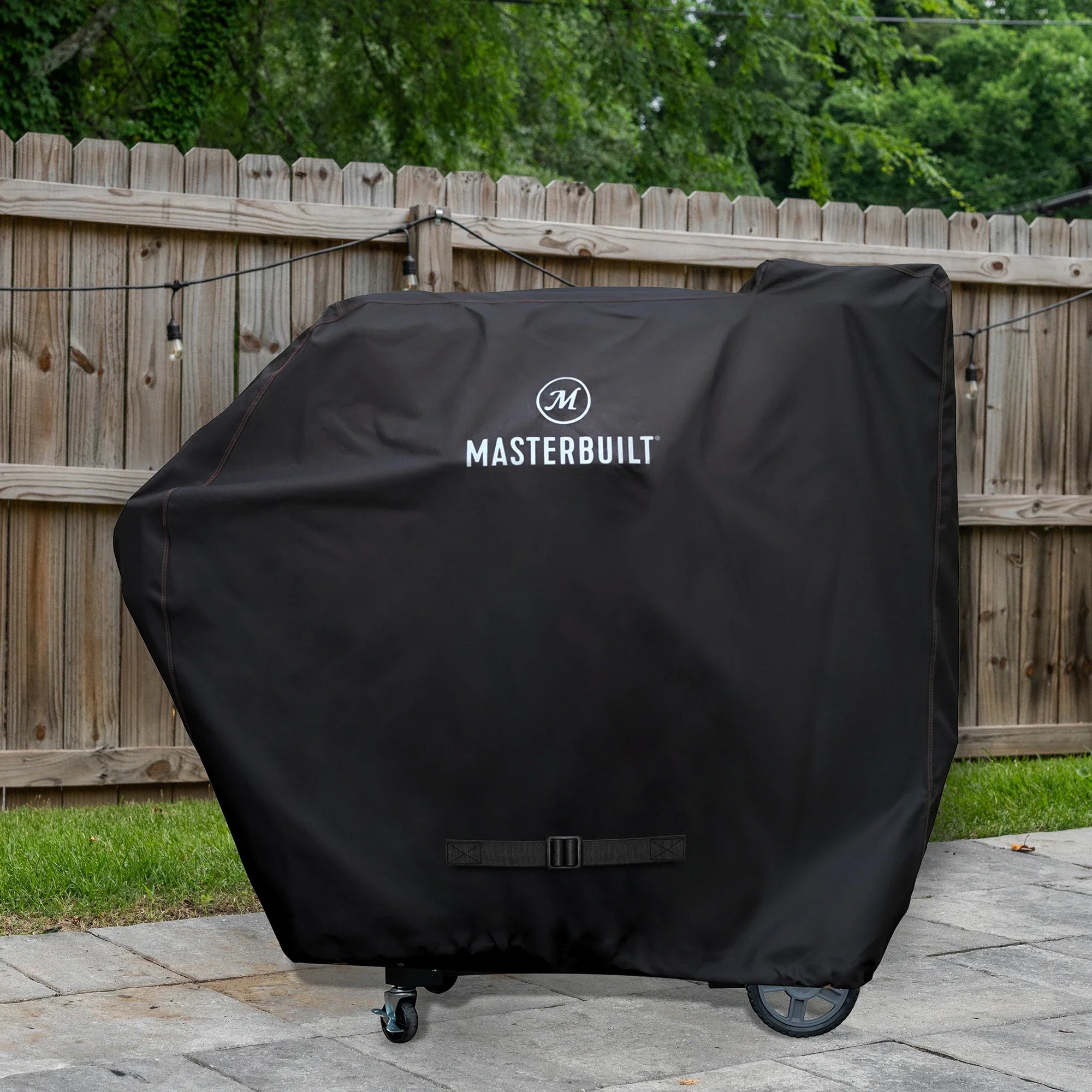 Masterbuilt Gravity Series BBQ cover fitted on a charcoal BBQ outdoors