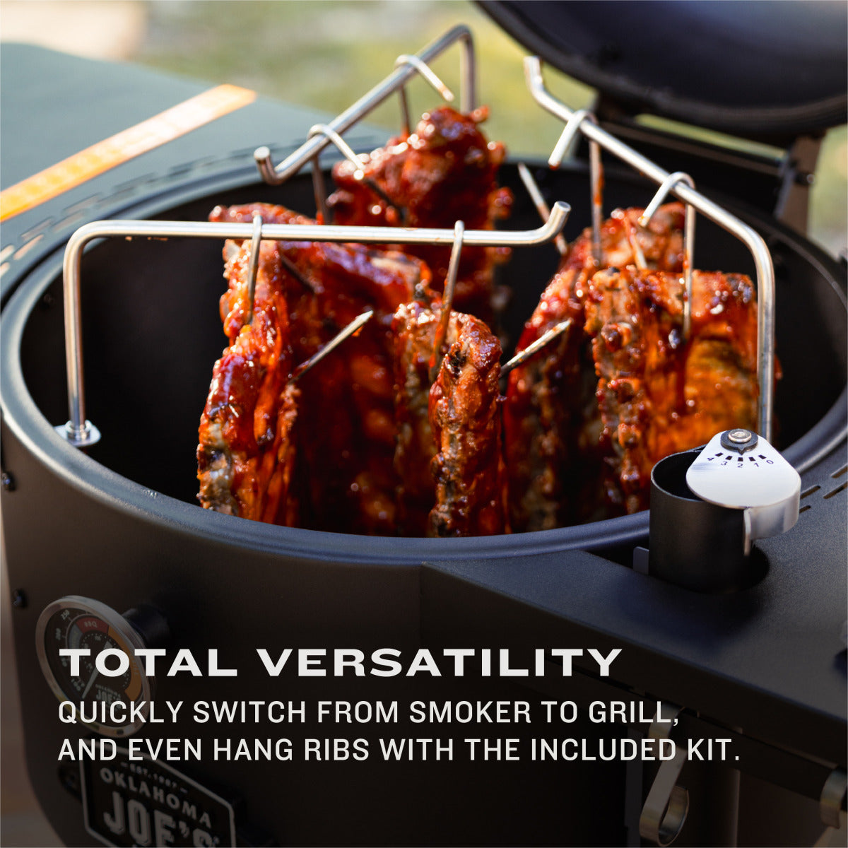 Hanging ribs in Oklahoma Joe’s Bronco Drum Smoker for ultimate charcoal smoking versatility