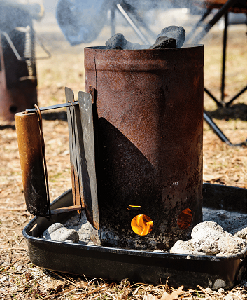 How to Light Lump Charcoal with a Chimney Starter