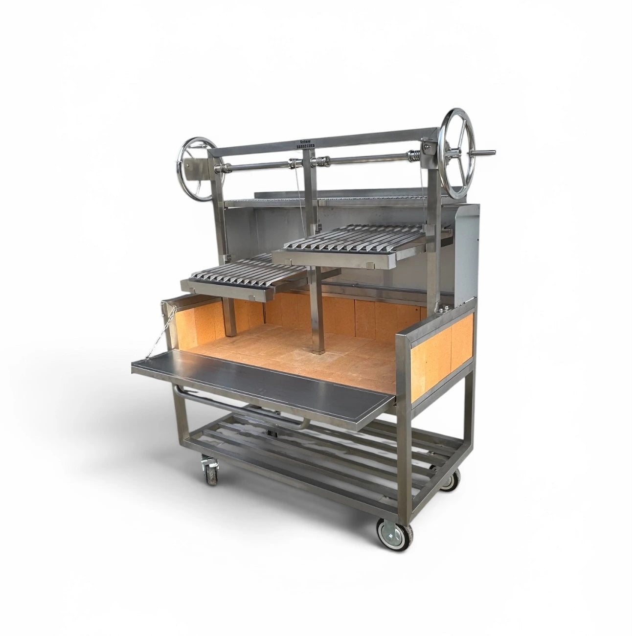 Angled view of 304 stainless steel Parrilla BBQ with drop down charcoal access door, adjustable grills, and fire brick cooking chamber.