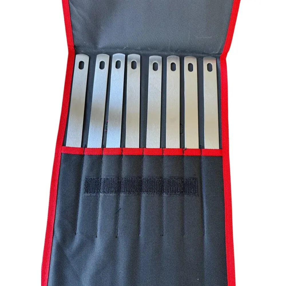Top view of flat Adana skewers neatly stored in open carry case