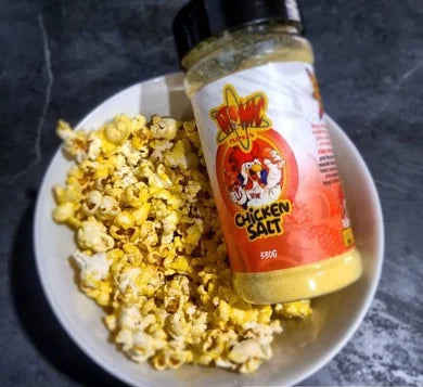 Bowl of popcorn seasoned with Atomic Chicken chicken salt
