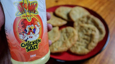 Flatbread with a jar of Atomic Chicken salt seasoning