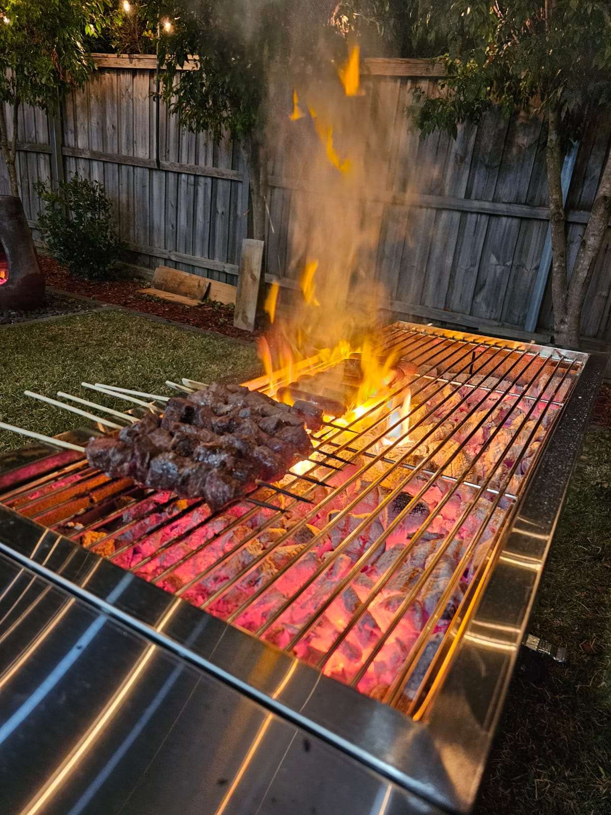 charcoal grill flame grilled sausages