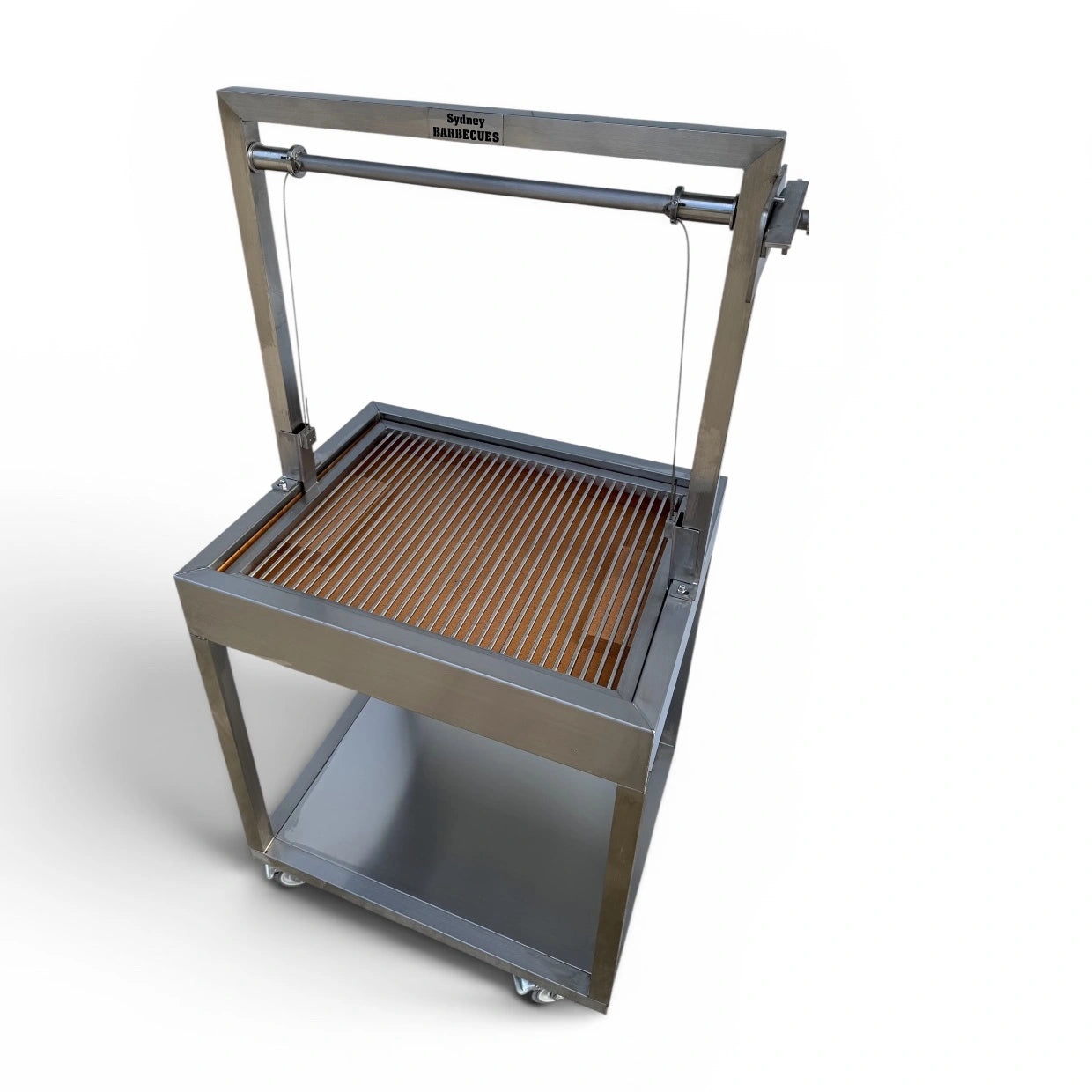 Top angled view of compact Parrilla BBQ with round bar grill, charcoal cooking area, and stainless steel frame.