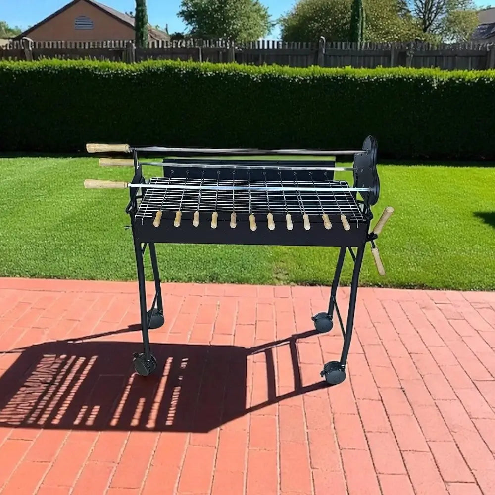 Cyprus grill spit with charcoal BBQ set up on red brick patio