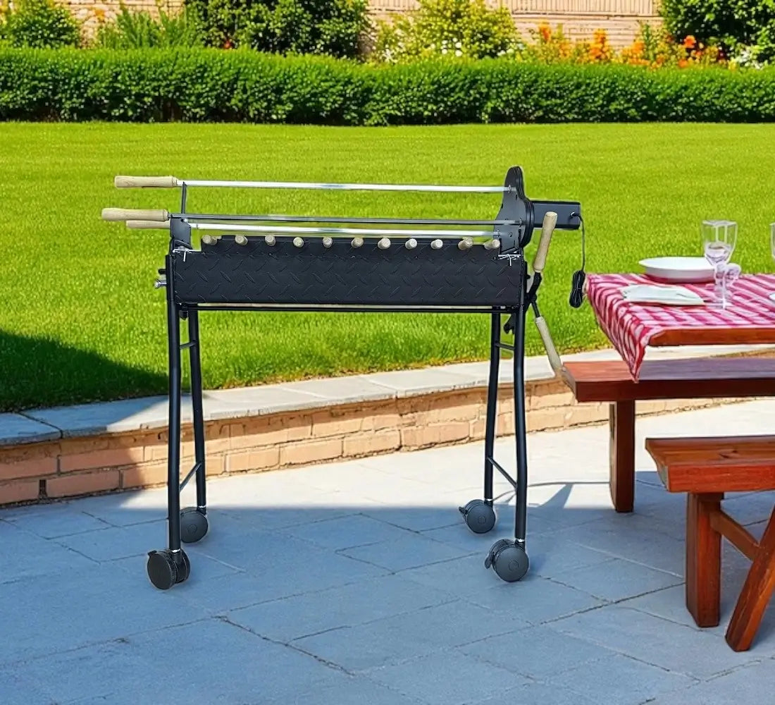 Greek souvla Cyprus BBQ set up in backyard with lawn and table