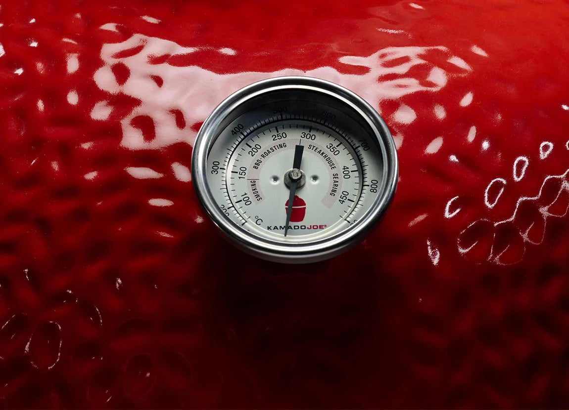 Kamado Joe Classic Joe II built in temperature gauge on red ceramic dome