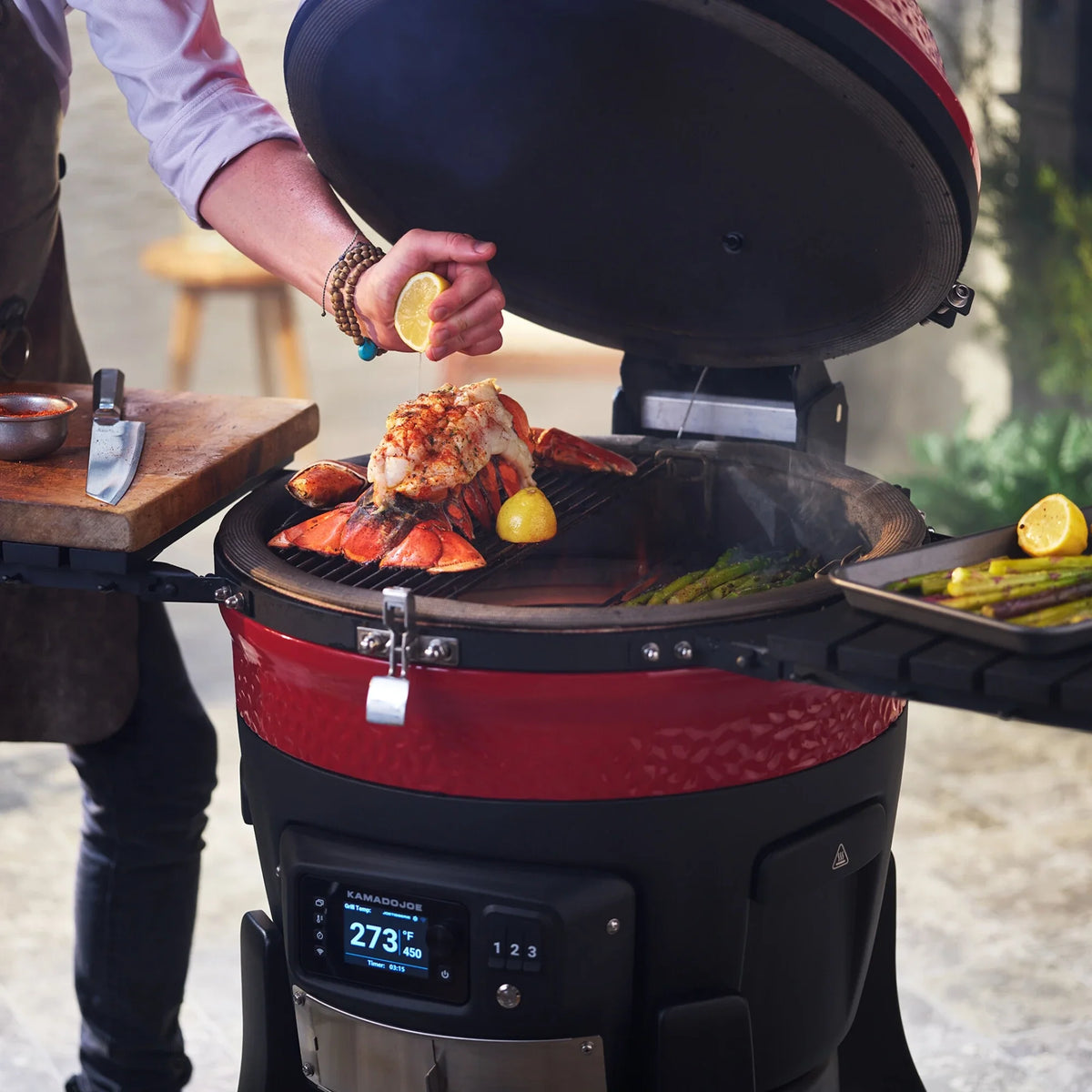 Food cooking on the Konnected Joe grates