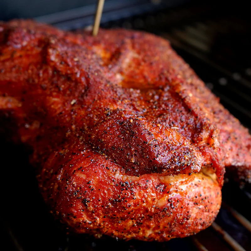 Pork shoulder coated with Lane’s Magic Dust BBQ rub ready for low and slow cooking