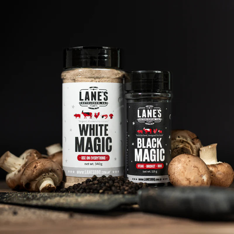 Lane’s White Magic and Black Magic rubs with mushrooms and spices on table