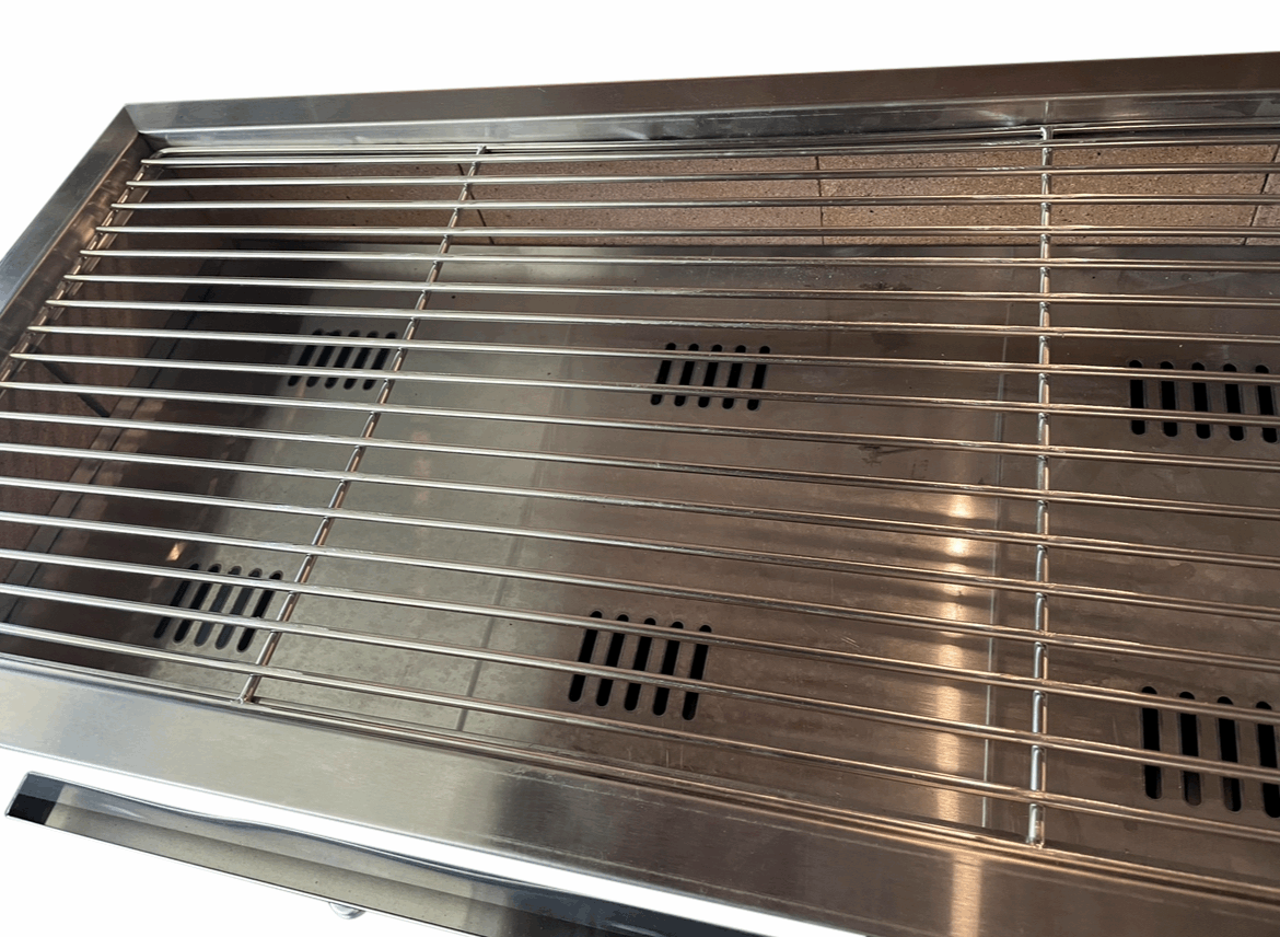 stainless steel grill with firebricks