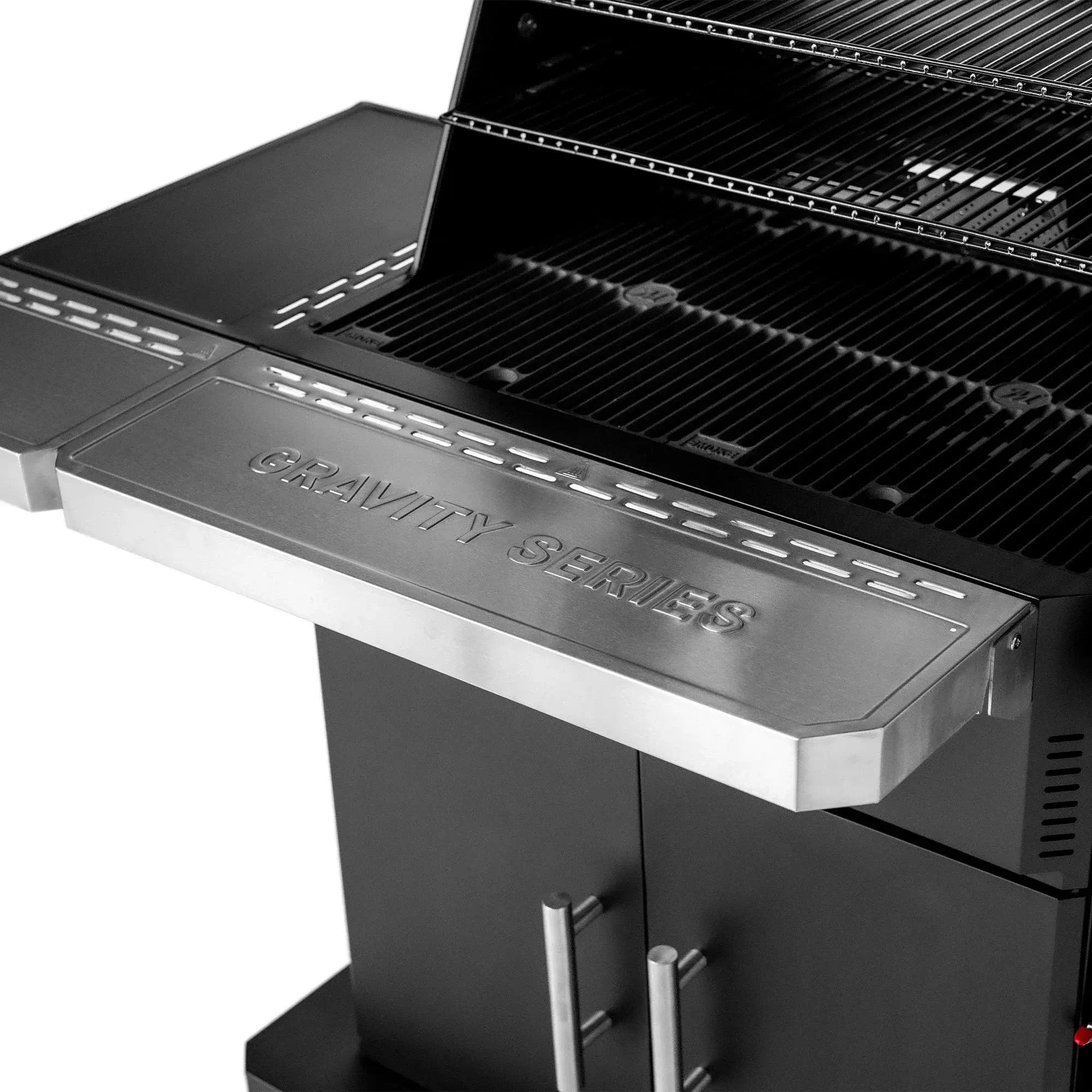 Cast iron Smoke and Sear cooking grates inside the Masterbuilt Gravity Series 1150