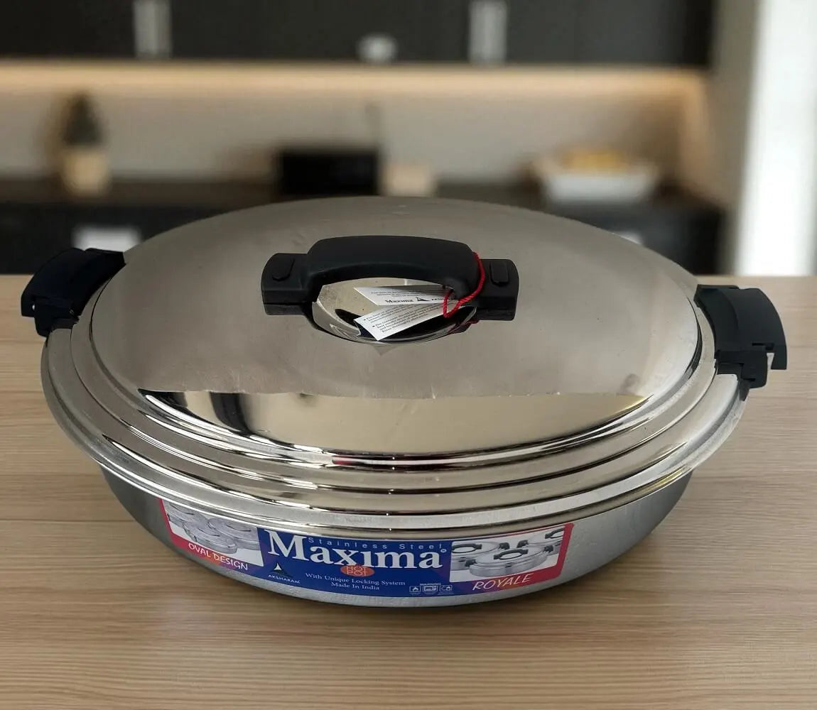 Maxima 7.5L food warmer with plastic handles on a kitchen bench – lifestyle image