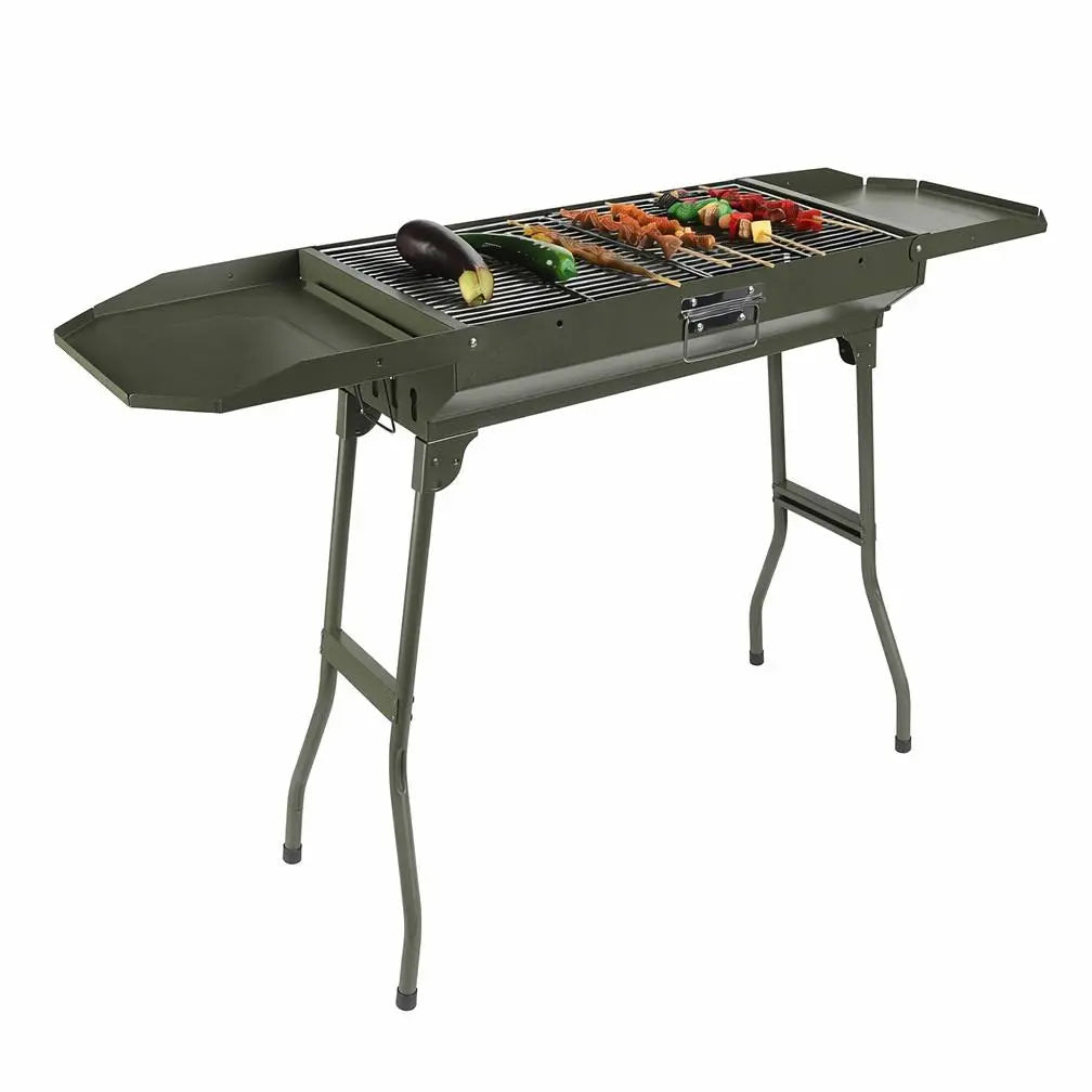 Portable charcoal BBQ with folding side benches cooking meat skewers and vegetables