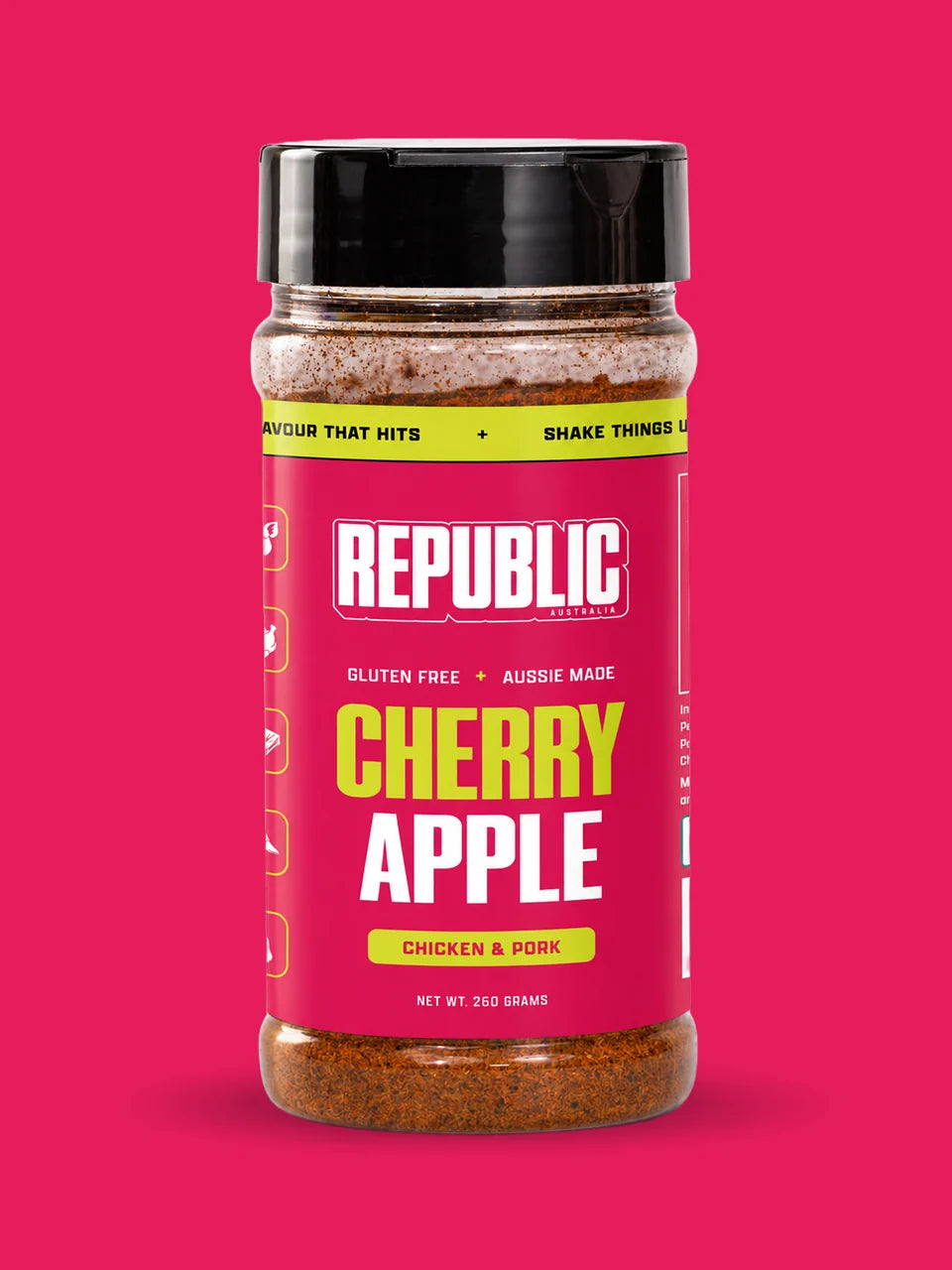 Republic Cherry Apple Chicken and Pork Seasoning jar on a bright pink background
