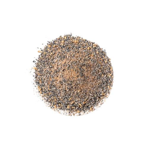 Close-up of SuckleBusters SPG rub showing coarse salt, pepper, and garlic blend