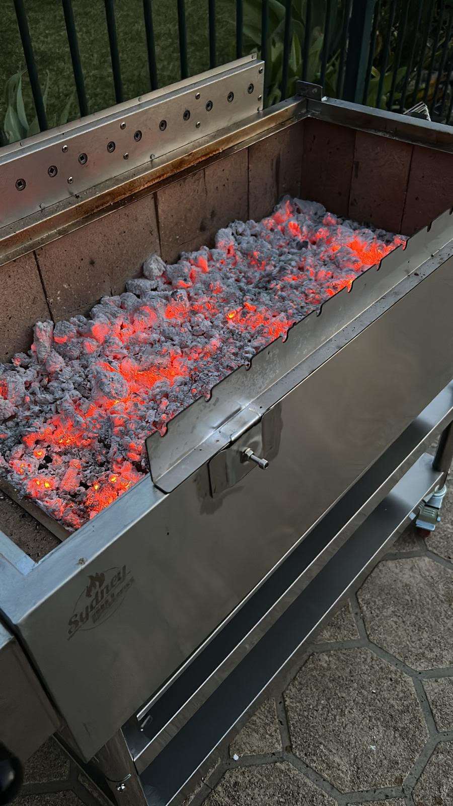 charcoal glowing in charcoal grill